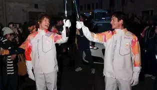 Hudson Williams and Connor Storrie Carry Olympic Torch for Milano Cortina 2026 Relay