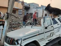 Three Injured as Bolero Overturns After Hitting Electric Pole on NH-57