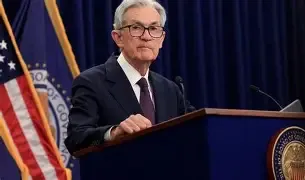 Federal Reserve Holds Interest Rates Steady, Signals Possible Cuts Later in 2026