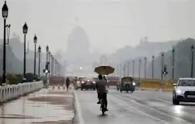 Unexpected Rain Hits Delhi-NCR as Cold Wave Intensifies, Temperatures Set to Fall Further