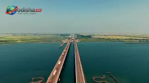 Construction work underway for the six-lane expansion of Palasuni Bridge on NH-16 in Odisha.