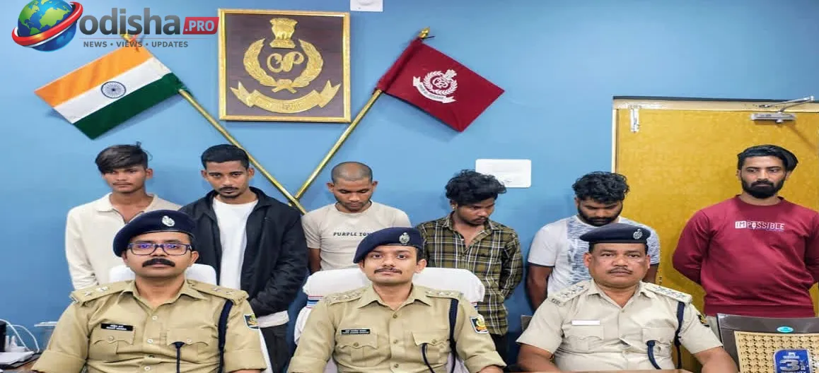 Police displaying seized intoxicating injections, cash and mobile phones after busting an illegal drug racket in Jeypore.
